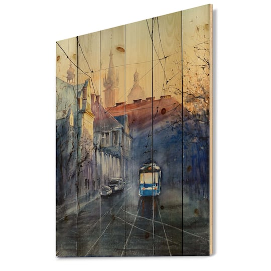 Designart - Blue Tram At Sunset With Church During Sunset - Nautical & Coastal Print on Natural Pine Wood